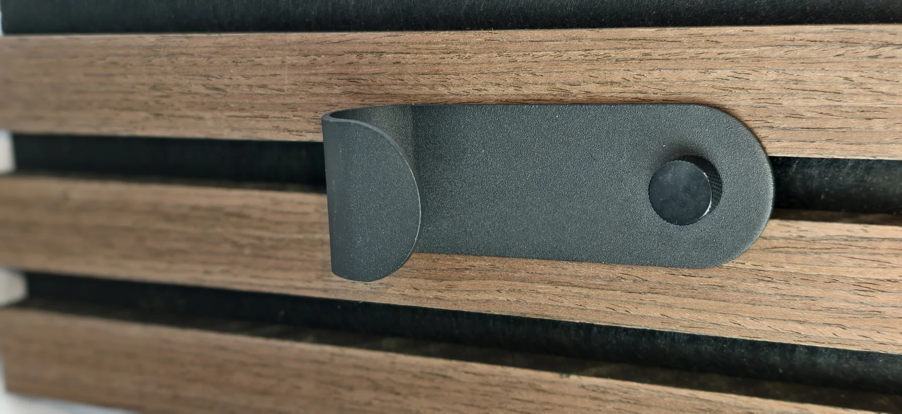 Installed single hook on a sample slat panel